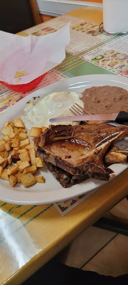 Chuletas De Cerdo Con Huevo